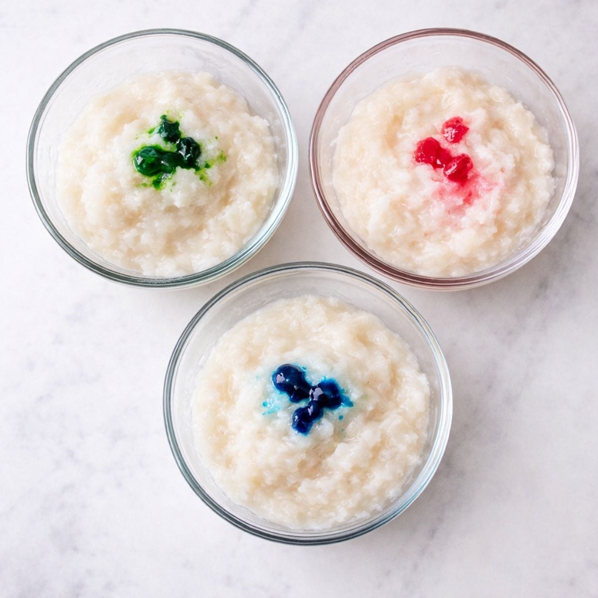 Adding food coloring to snow ice cream