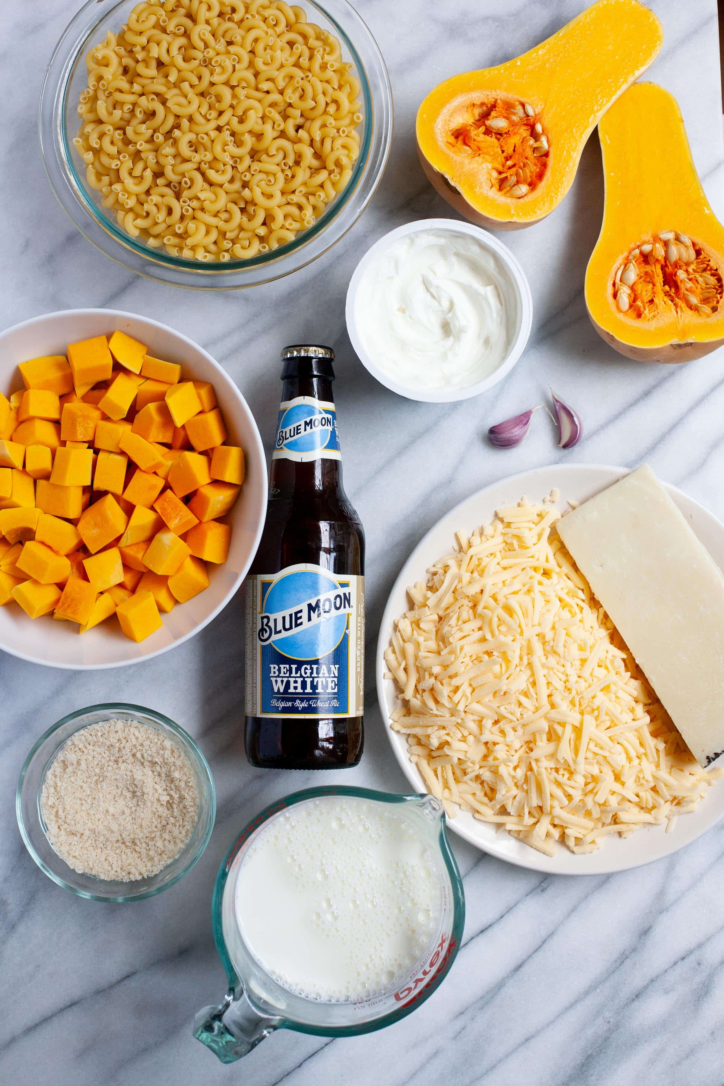 Ingredients for Beer and Butternut Squash Macaroni and Cheese in individual bowls