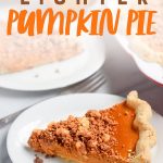 Slices of pumpkin pie with cinnamon walnut streusel on white plates. Text overlay reads "Lighter Pumpkin Pie."