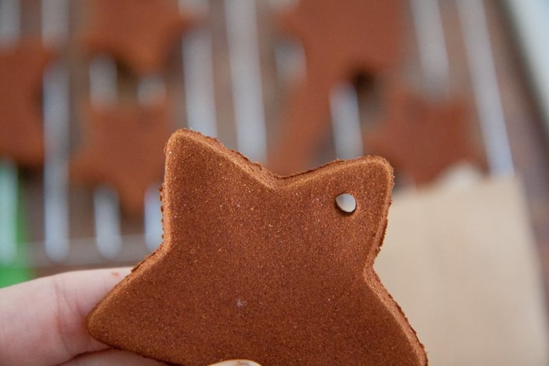 A star-shaped cinnamon ornament with rough edges