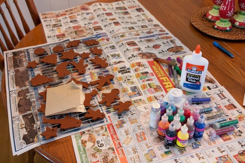 Cinnamon ornaments cooling on newspaper before decorating