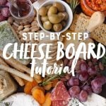Cheese, crackers, dried fruit, olives, and sausage with the text overlay "Step-by-Step Cheese Board Tutorial"