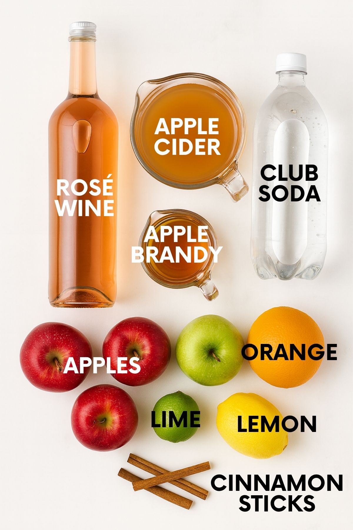Ingredients for rose sangria sit on a white marble countertop.