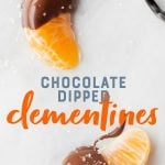 Two slices of clementine half-covered in chocolate on a white background. A text overlay reads "Chocolate Dipped Clementines."