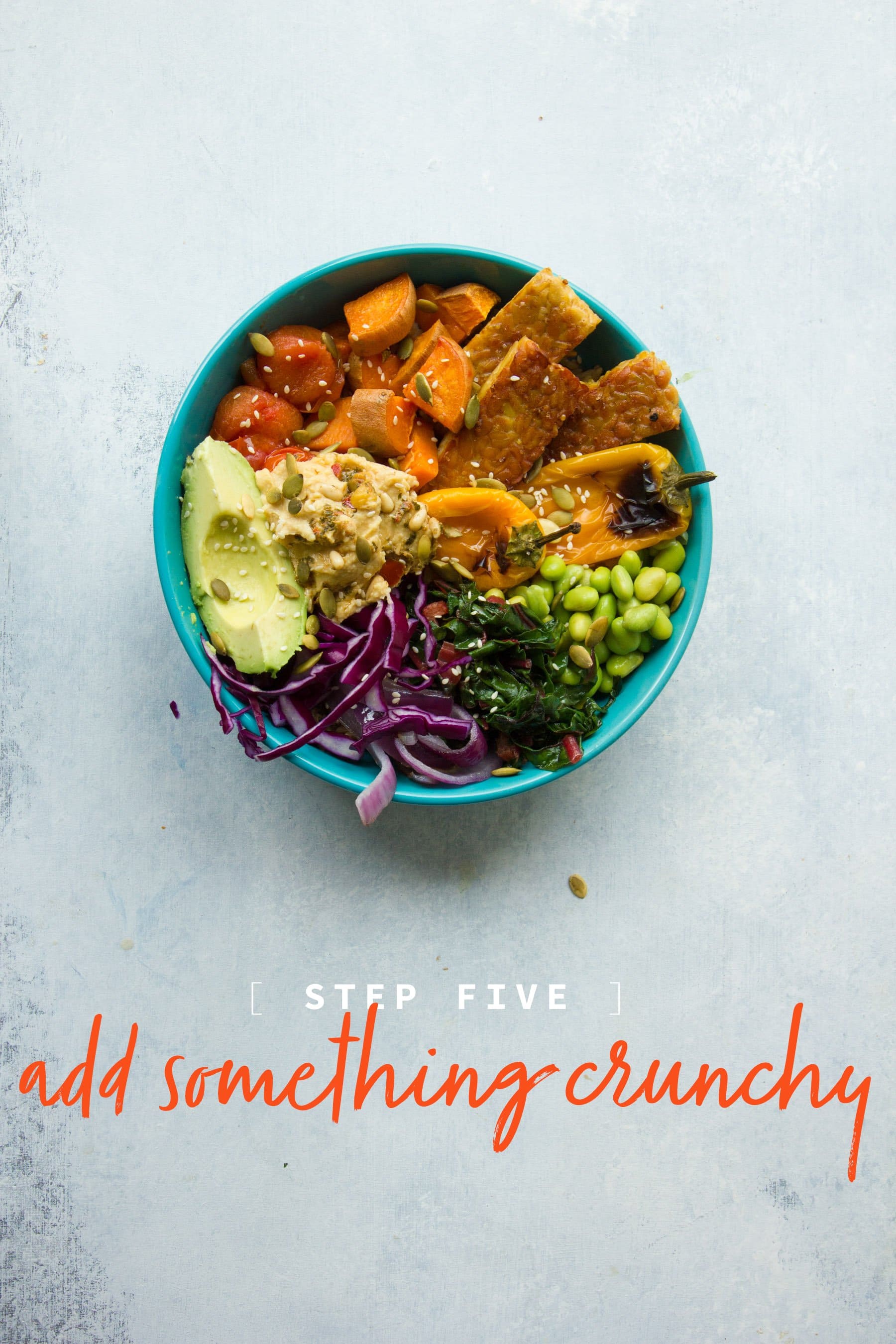 A teal bowl filled with tofu, sweet potatoes, edamame, hummus, and other veggies. A text overlay reads "Step 5: Add something crunchy"