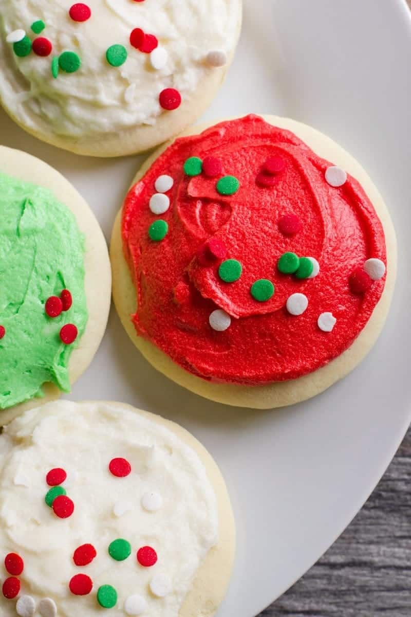 Lofthouse Sugar Cookies decorated in white, green, and red frosting, topped with sprinkles