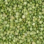 Close up of a pile of green split peas.