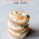 Three turkey spinach egg cups are stacked. Text overlay reads, "Turkey spinach egg cups."