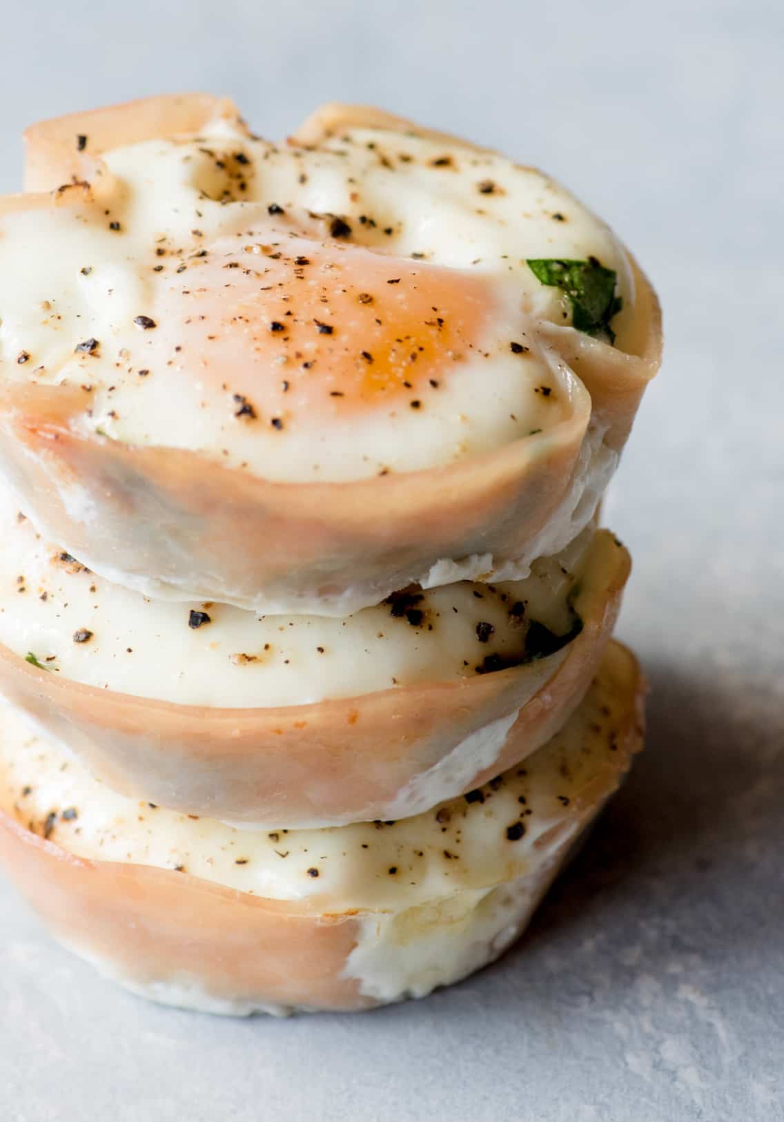 Three turkey spinach egg cups are stacked.