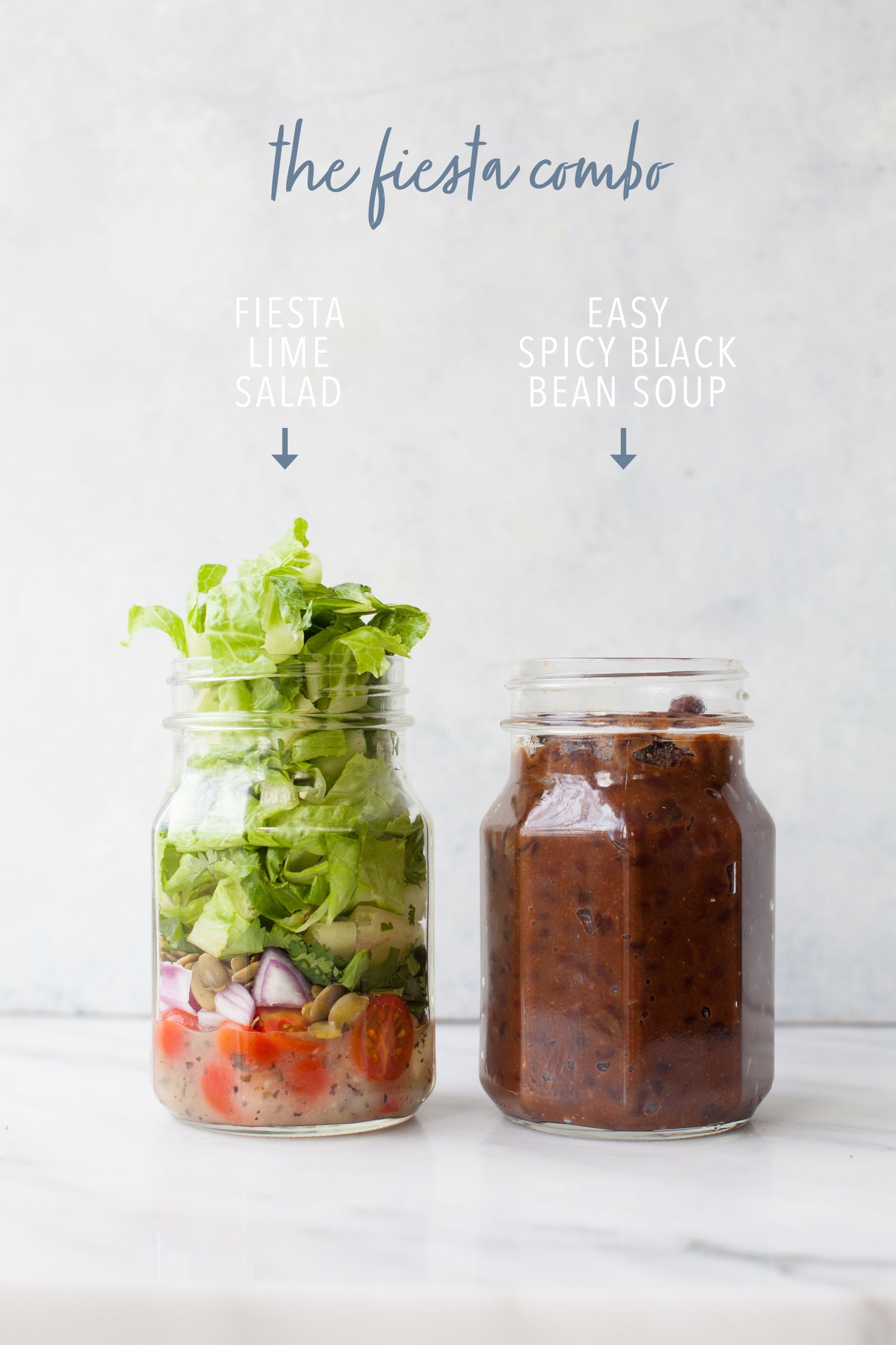 Two canning jars on gray background, one with salad and one with soup