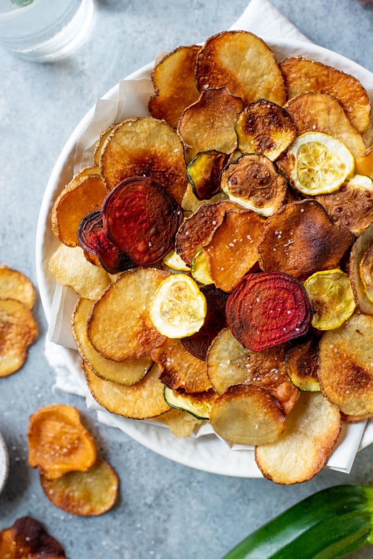 Close-up shot of Baked Vegetable Chips in a white bowl