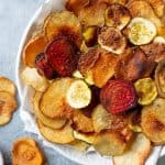 Close-up shot of Baked Vegetable Chips in a white bowl