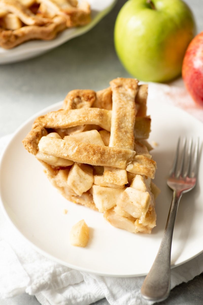 Slice of apple pie with a lattice top crust