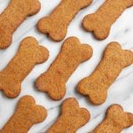 Healthy Homemade Dog Treats laid out on a marbled white background