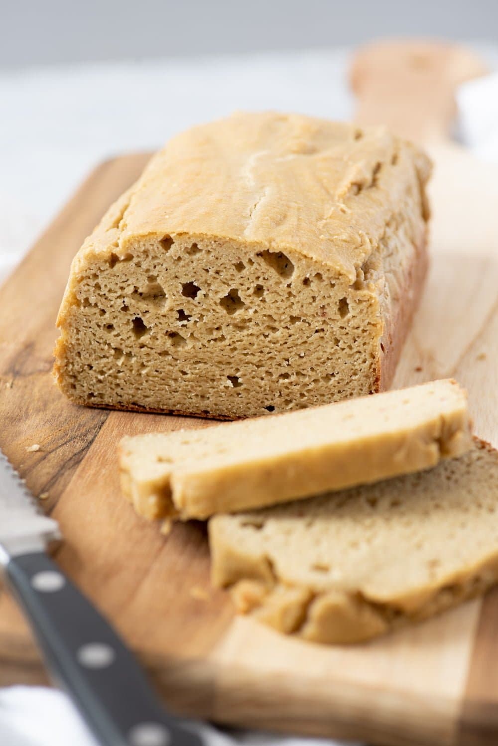 Loaf of Grain-Free Cashew Sandwich Bread with two slices cut off