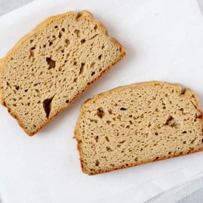 Two slices of Grain-Free Sandwich Bread on a white background