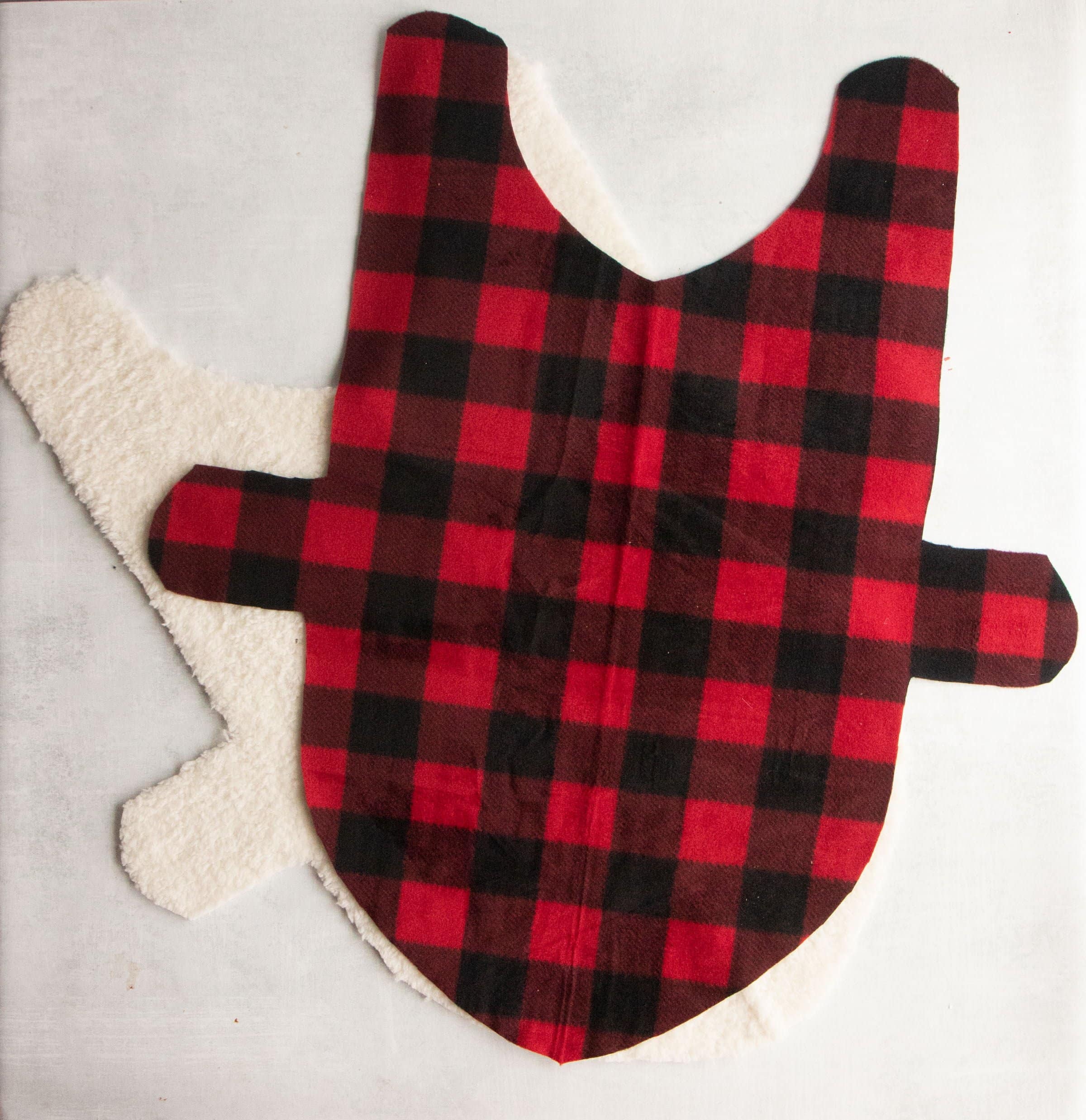 Fleece and faux fur fabric cut out for a dog coat