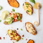 Four types of sweet potato arranged on a white background