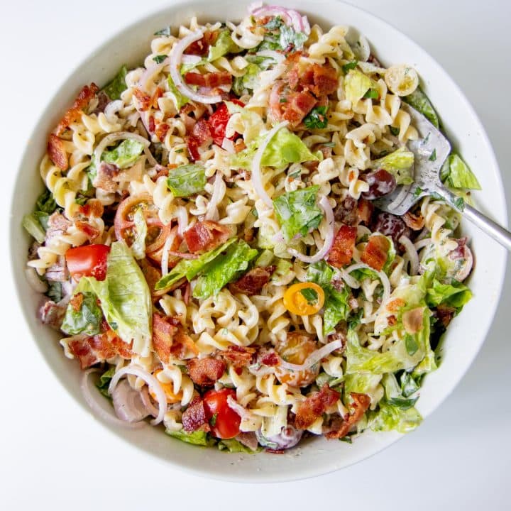 Ranch BLT Pasta Salad in a white bowl on a white background