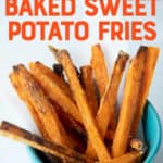 Crispy baked sweet potato fries in a small blue bowl. A text overlay reads "Crispy! Baked Sweet Potato Fries."