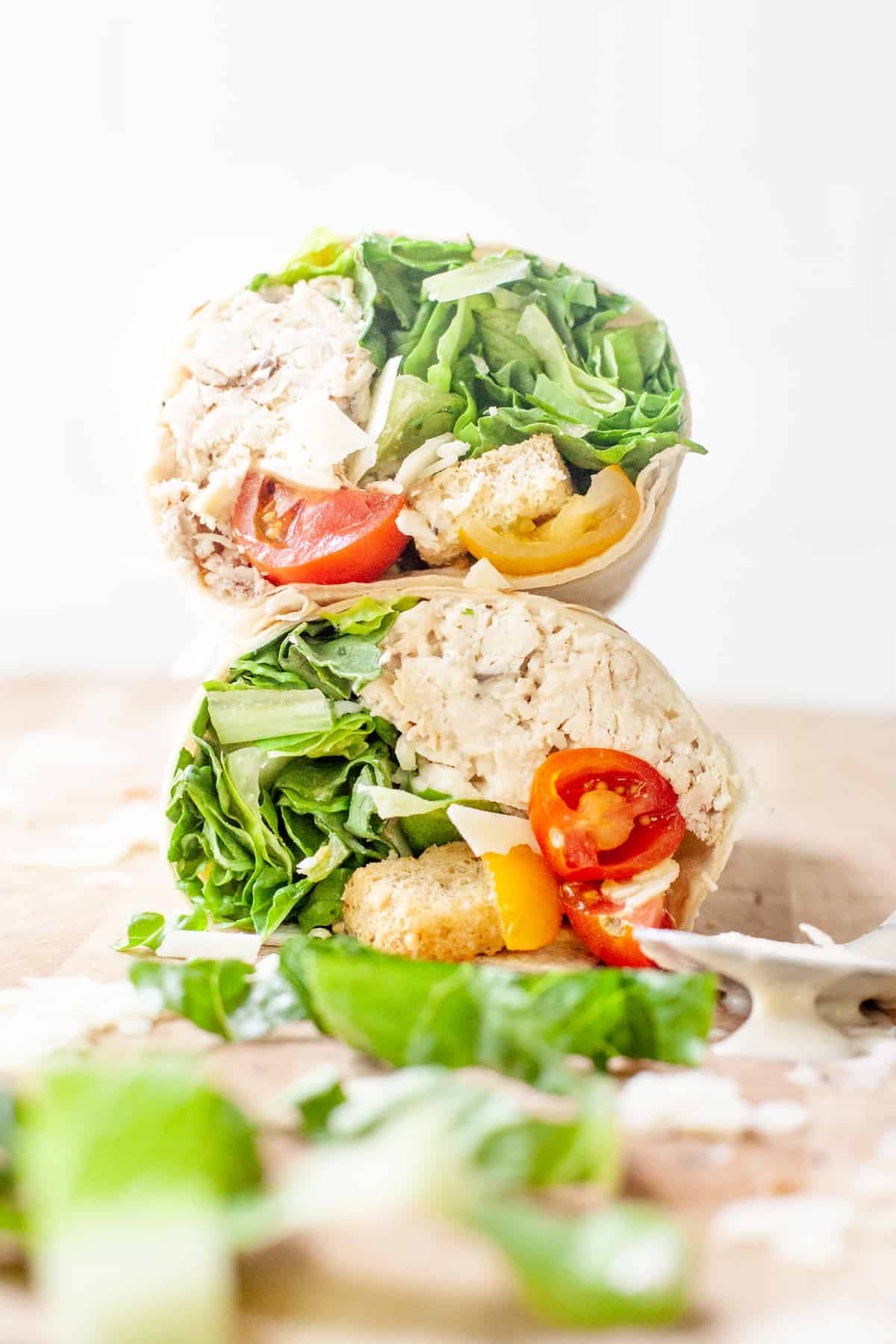 https://wholefully.com/wp-content/uploads/2020/02/chicken-caesar-wraps-stacked.jpg