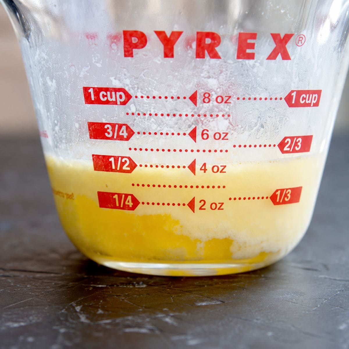 Layers of butter in a measuring cup