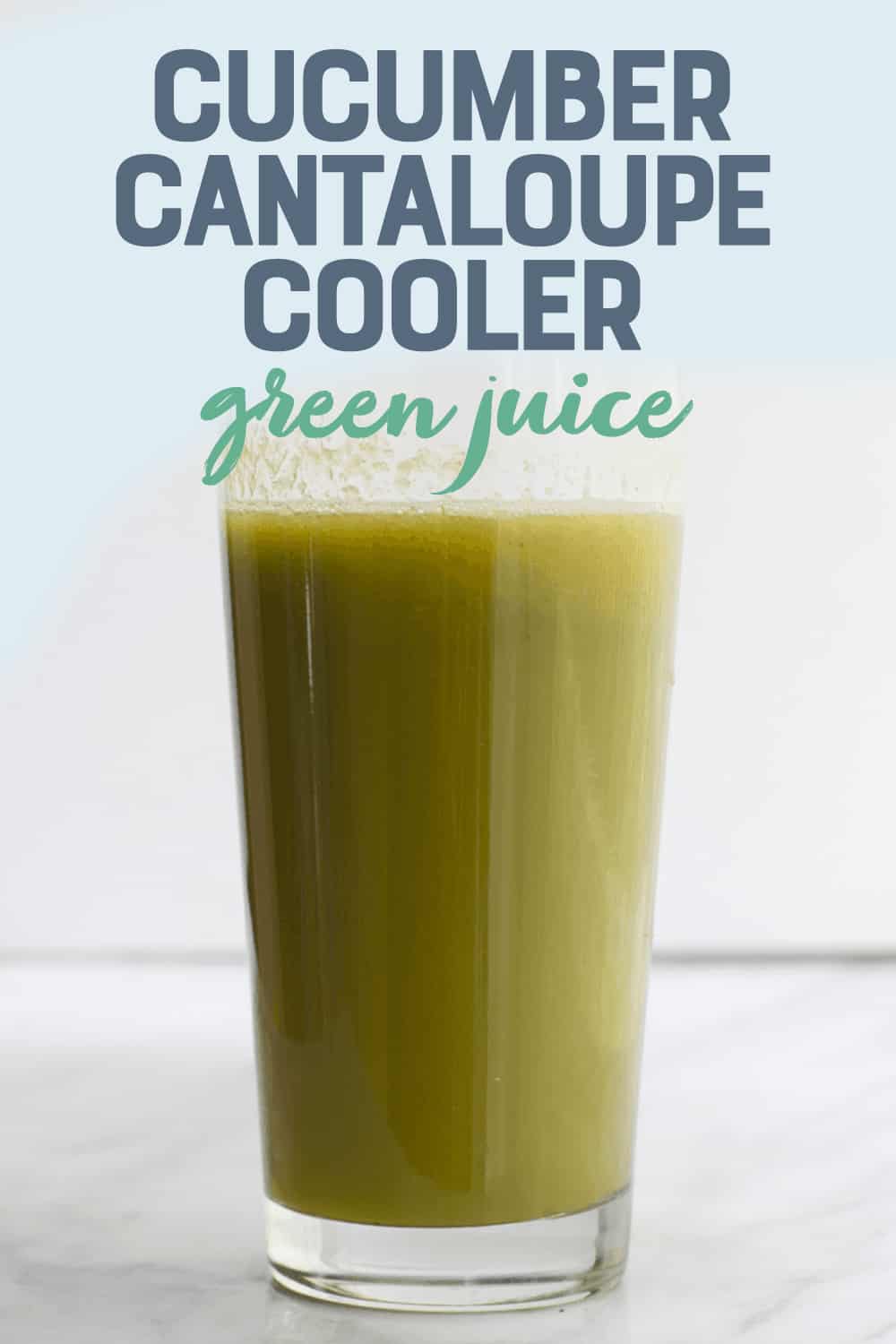 Close-up of a tall glass of fresh cucumber cantaloupe cooler. A text overlay reads, "Cucumber Cantaloupe Cooler Green Juice."