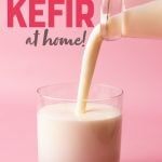 Close-up of pouring homemade kefir into a glass tumbler. A text overlay reads, "How to Make Kefir at Home!"