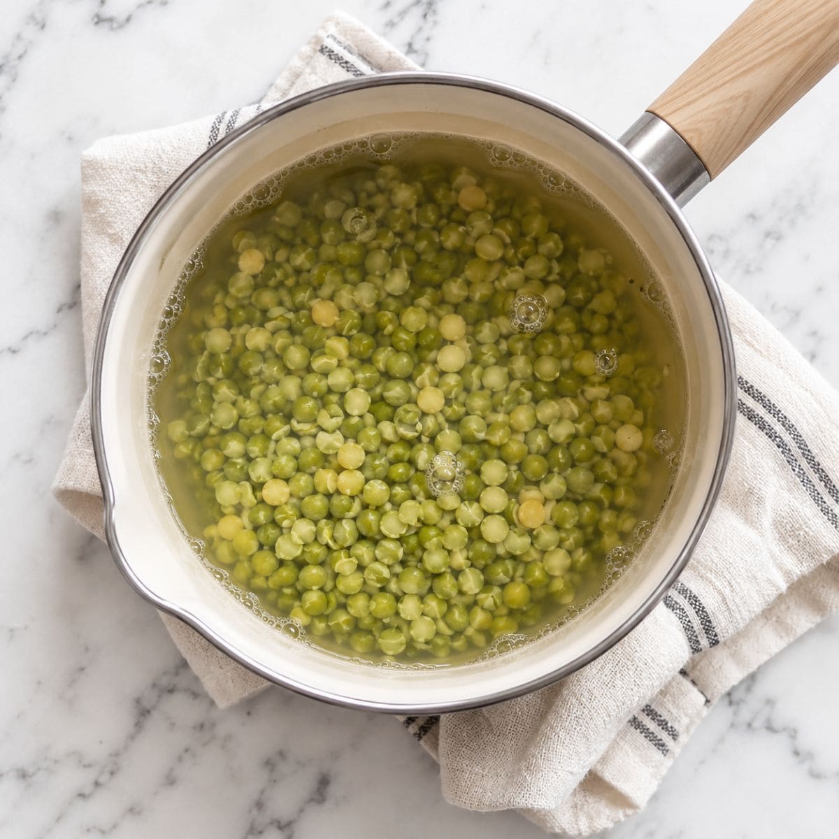 A pot of cooked split peas on a countertop