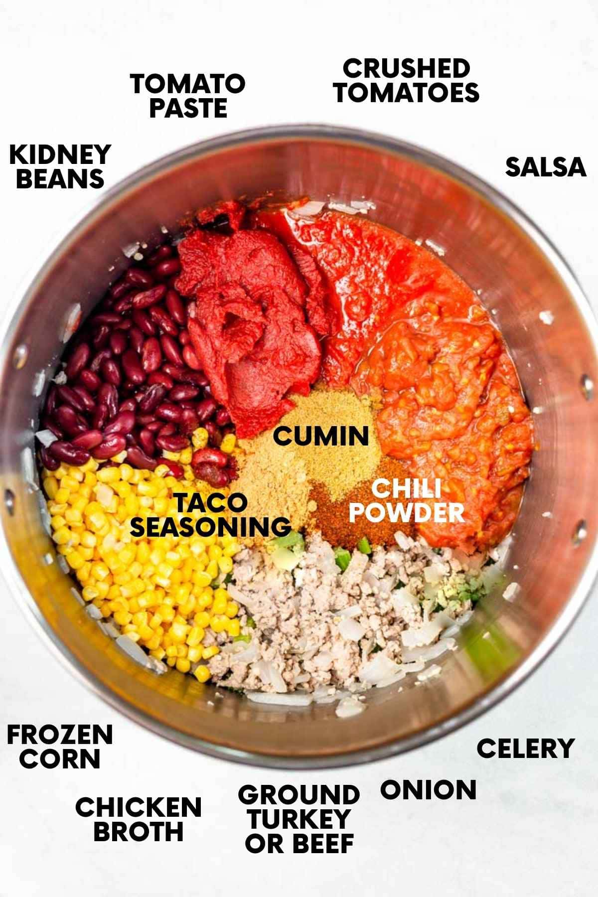 Taco chili ingredients in a pot on a while countertop