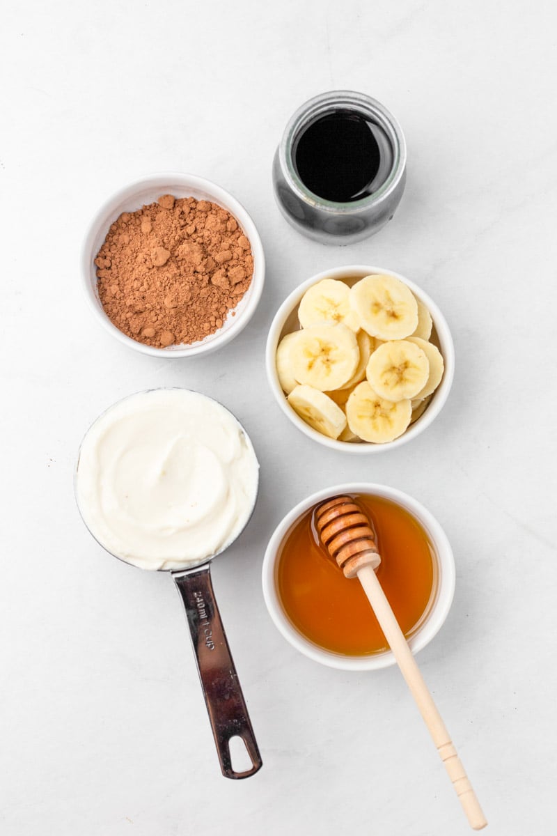 Overhead of ingredients to make mocha smoothie.