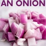 Close-up of a pile of chopped red onion on a white marble countertop. A text overlay reads, "Mastering Kitchen Basics. How to Cut an Onion. Mince, Dice, Chop, Slice."