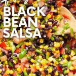 Close up of finished black bean and corn salsa. A text overlay reads, "Fresh Black Bean Salsa."
