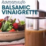 Close up of homemade balsamic vinaigrette in an easy-pour glass cruet. A text overlay reads, "Easy. Healthy. Cheap. Homemade Balsamic Vinaigrette."