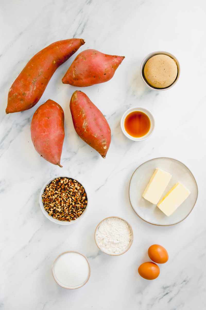 Overhead of all ingredients needed to make an easy sweet potato casserole.