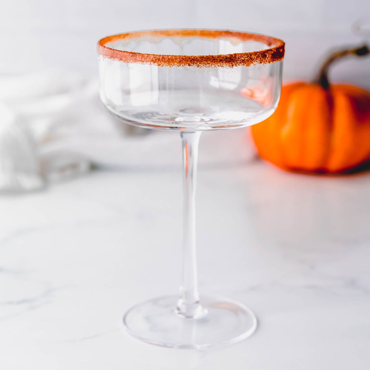 Rimmed martini glass with cinnamon and sugar