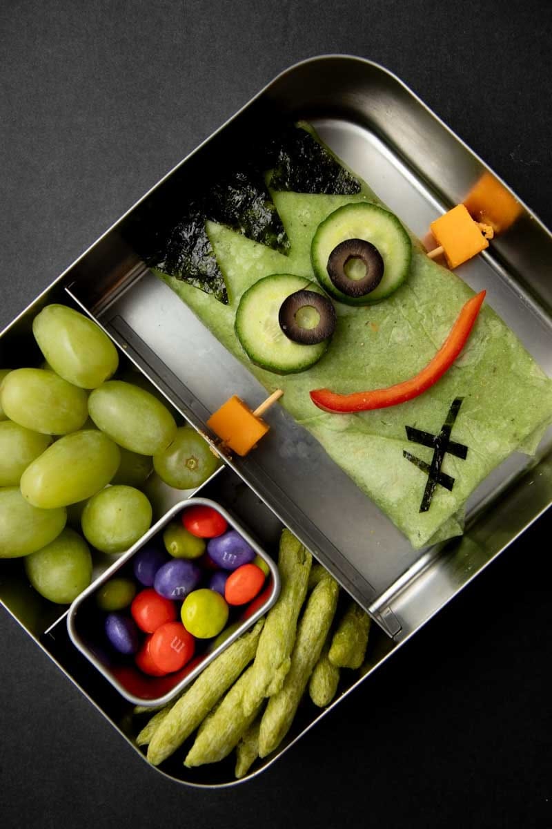 Halloween lunch idea: Frankenstein wrap in a bento-style lunchbox.