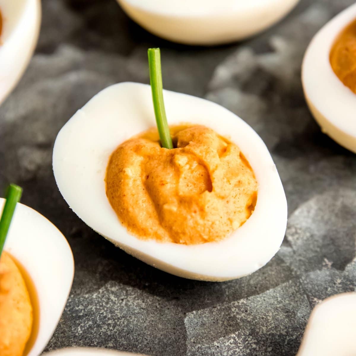 Close-up on a pumpkin deviled egg.