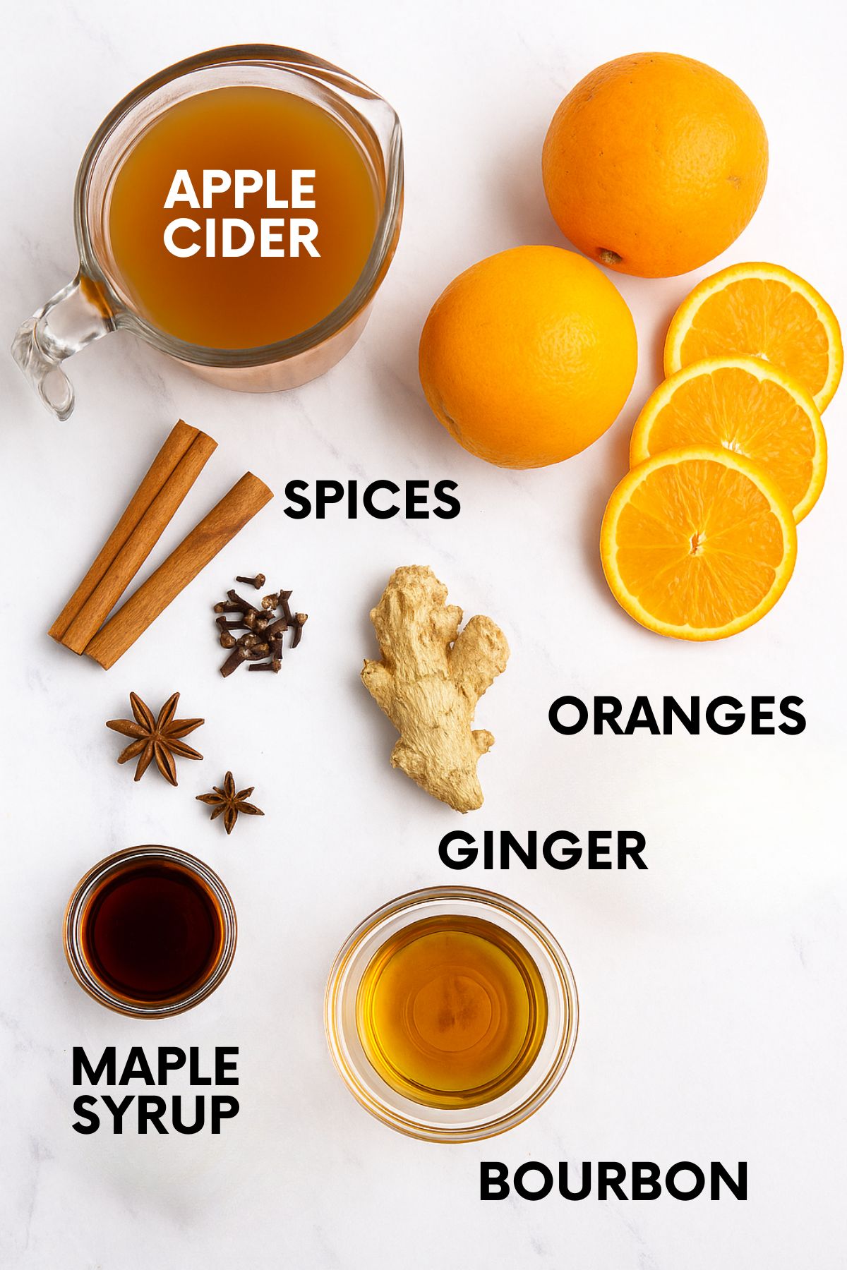 Ingredients for spiked apple cider sit on a white marble countertop: apple cider, spices, oranges, ginger, maple syrup, bourbon