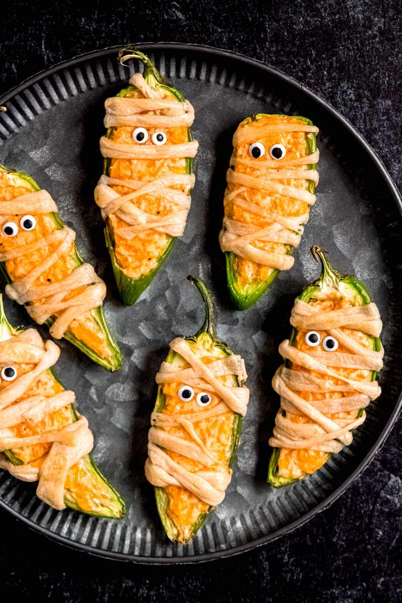 Top view of a Halloween party platter filled with spooky appetizers.