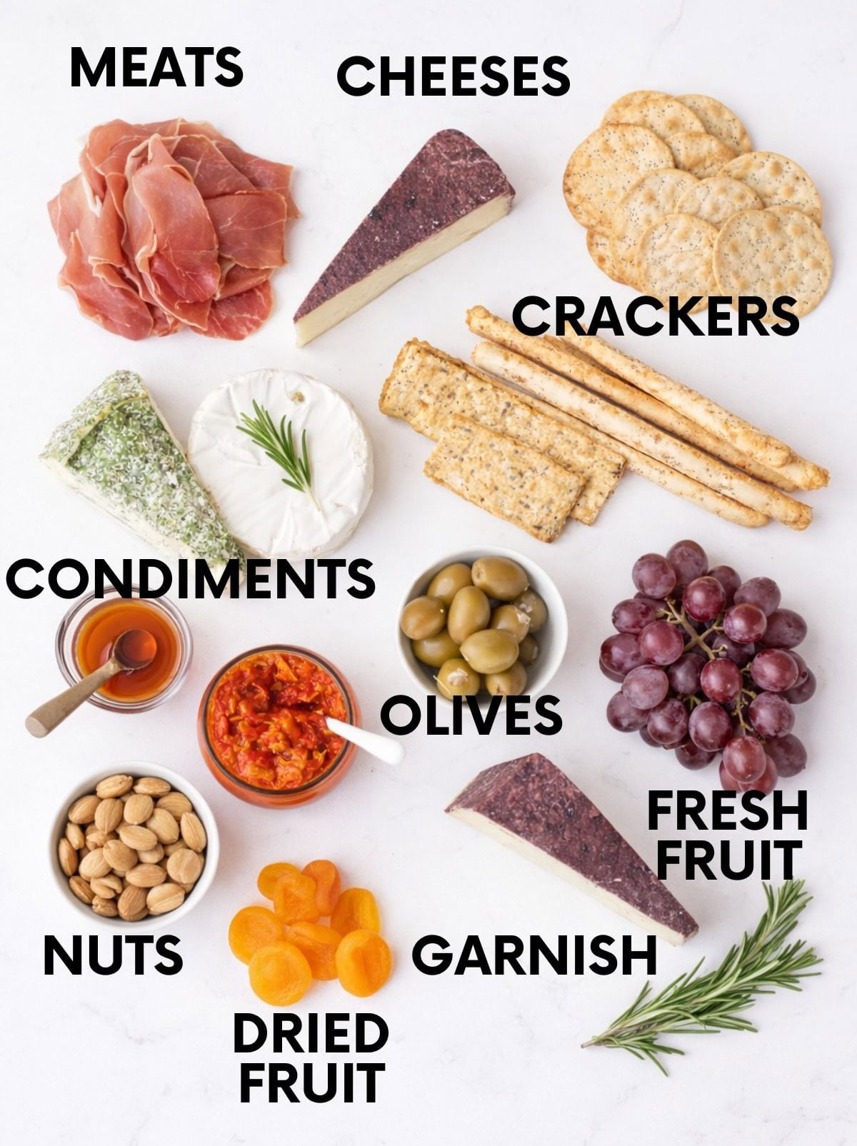 Ingredients for making a cheese board on a countertop
