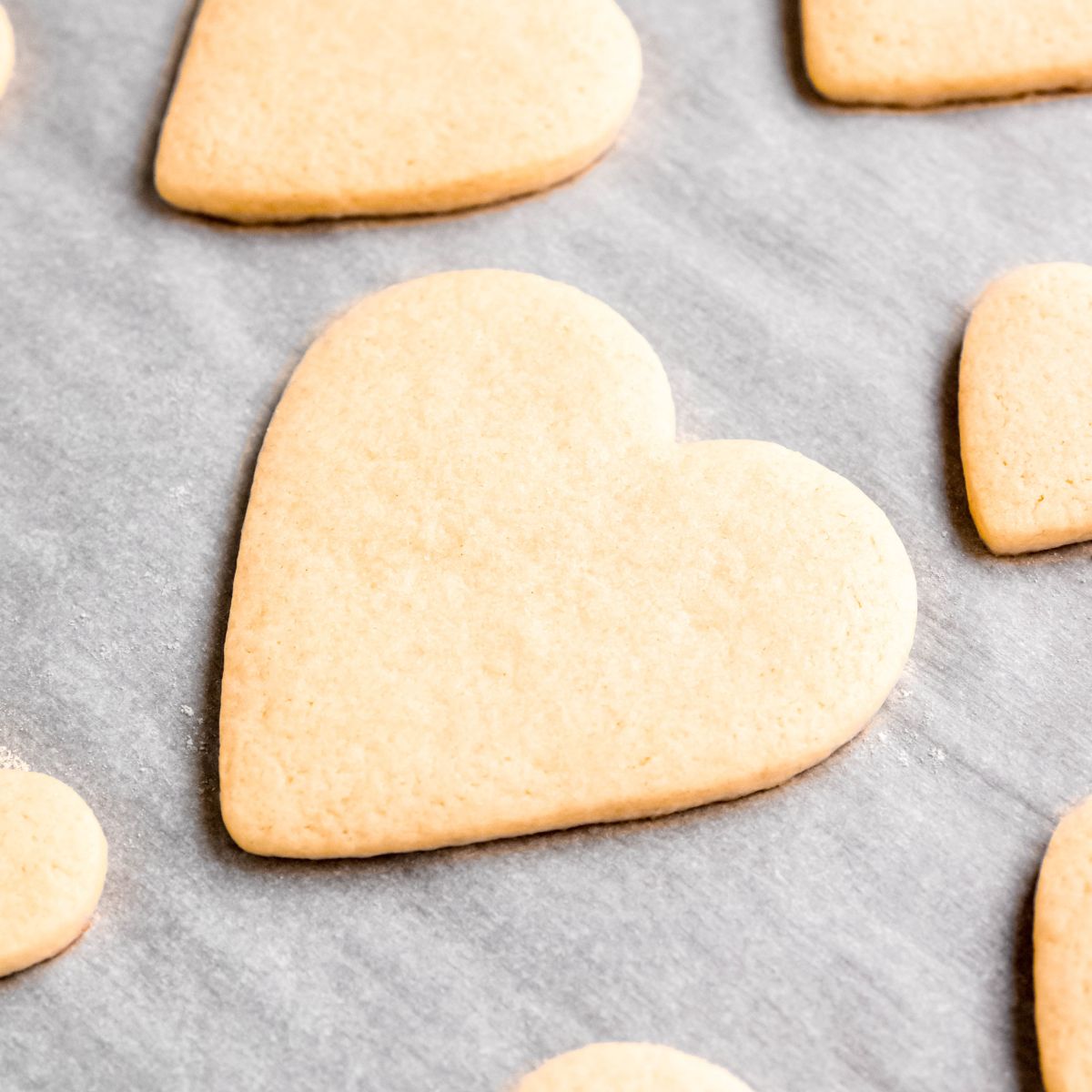 Baked heart sugar cookies on tray