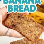 A hand holding a slice of banana bread with ripe bananas in the background, under text reading "Paleo + Gluten-Free Banana Bread, Naturally Sweetened!"