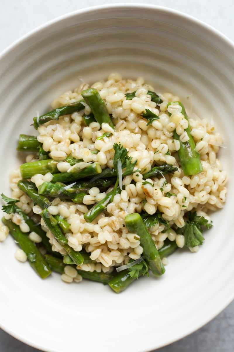 Grains and veggies served in a white bowl.