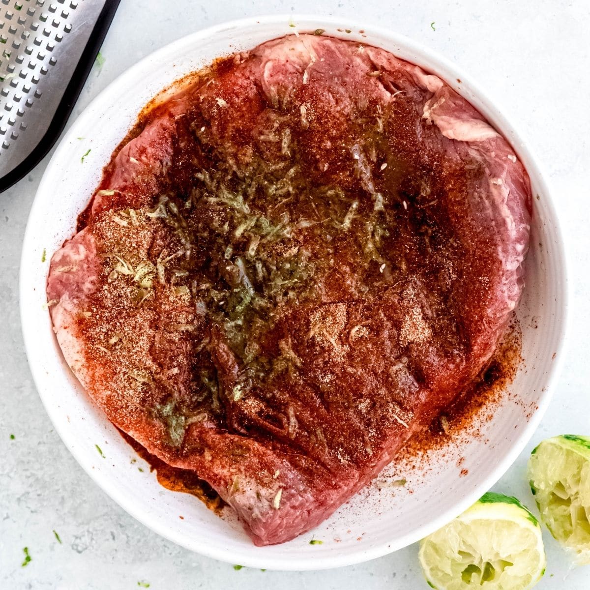 Flank steak marinated with fajita seasoning and lime