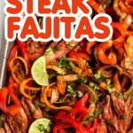 Sheet pan steak fajitas on a pan with the text "Sheet Pan Steak Fajitas"