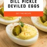 Close view of a deviled egg with a dill pickle chip and sprig of dill garnishing the top. A text overlay reads, "Easy Appetizer! Dill Pickle Deviled Eggs. Get the Recipe."