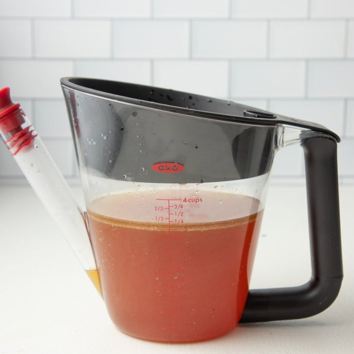 Turkey drippings in a fat separator.