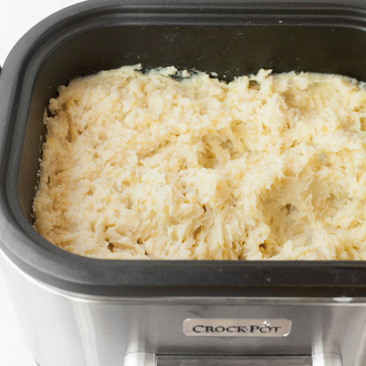 Mashed potatoes in a crock pot.