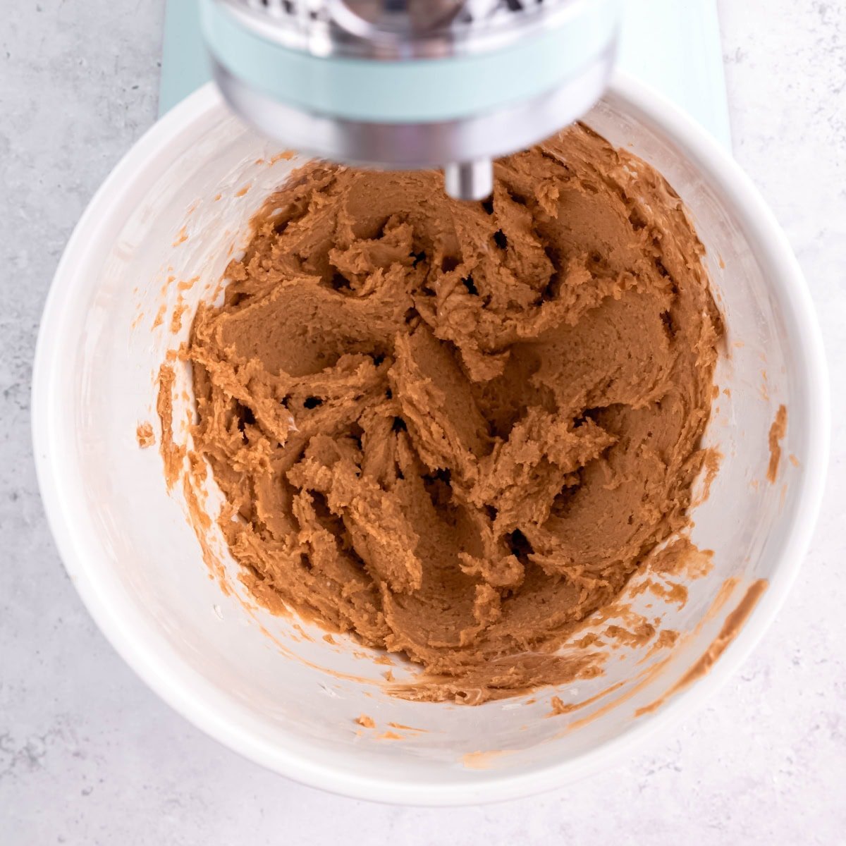 The first step of peanut butter pie filling, before adding the cream. It looks whipped but sticky.